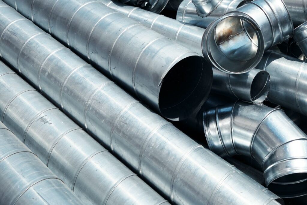Galvanized metal duct pipes and fittings for industrial piping applications